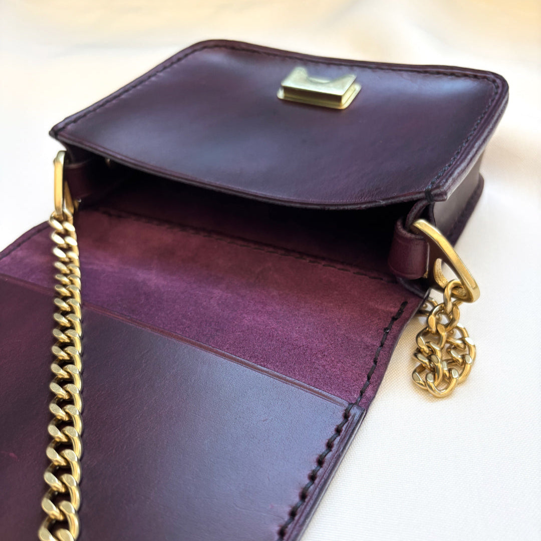 purple leather mini crossbody purse open angle view
