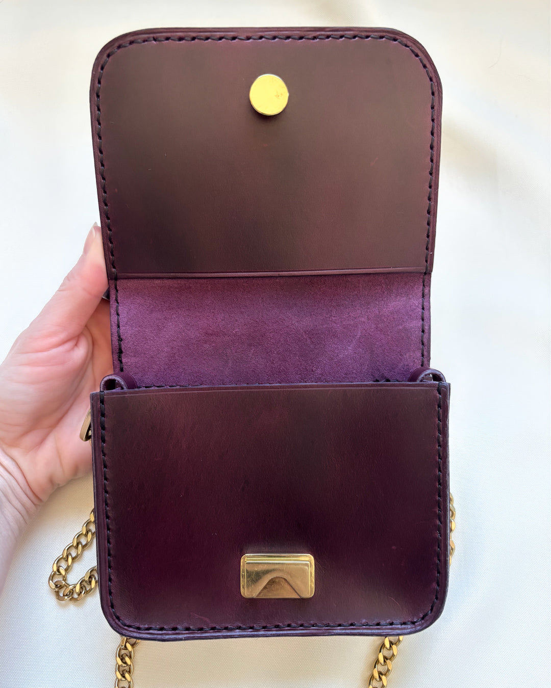 purple leather mini crossbody purse flat open view