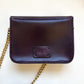 purple leather mini crossbody purse back view